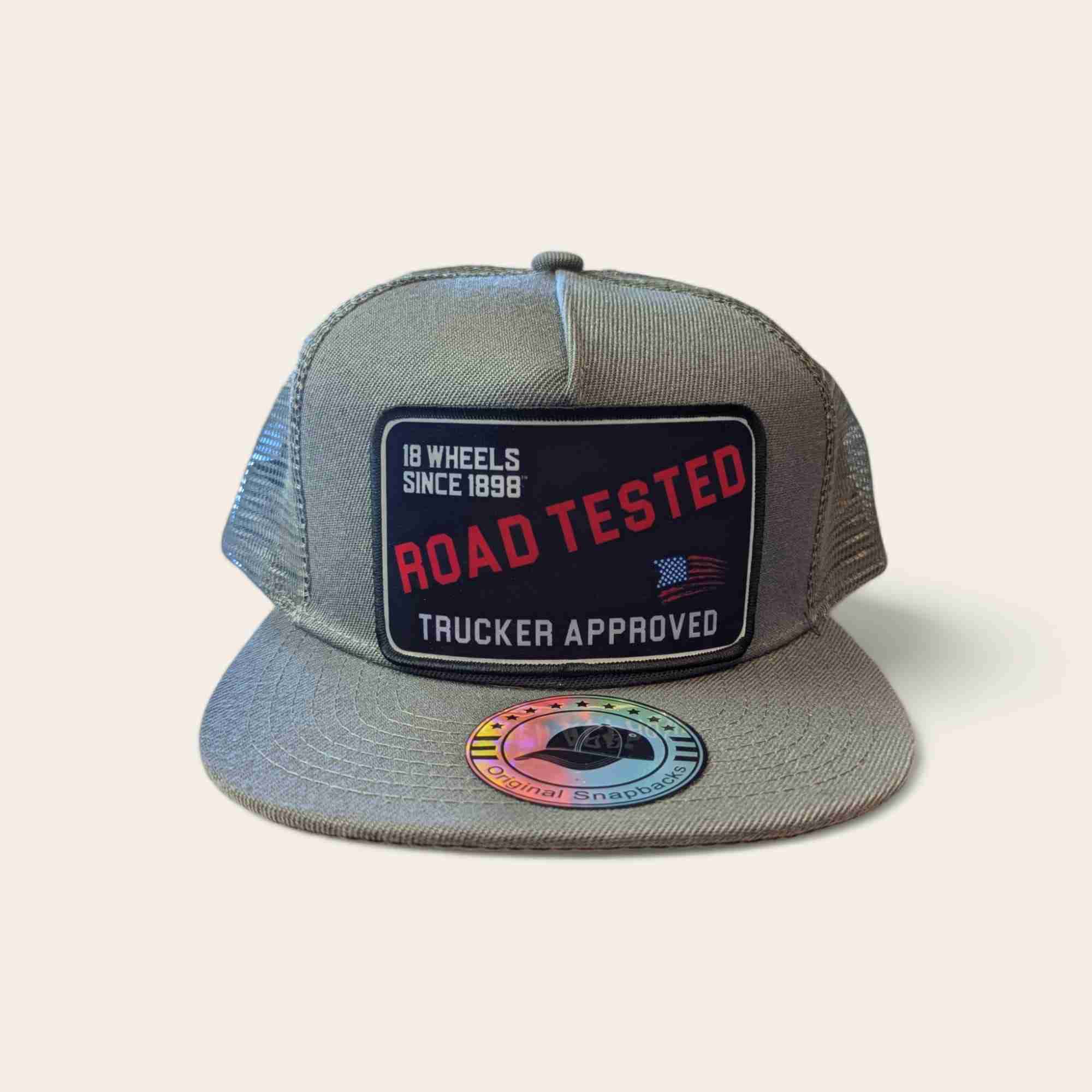 Built for the long haul, our Road Tested Trucker Approved LARGE patch hat is a nod to those who've put the miles behind them. Ideal for anyone in the shipping lanes or lovers of vintage trucker gear. *Snapback One Size Fits Most *Flatbrim Trucker Hat